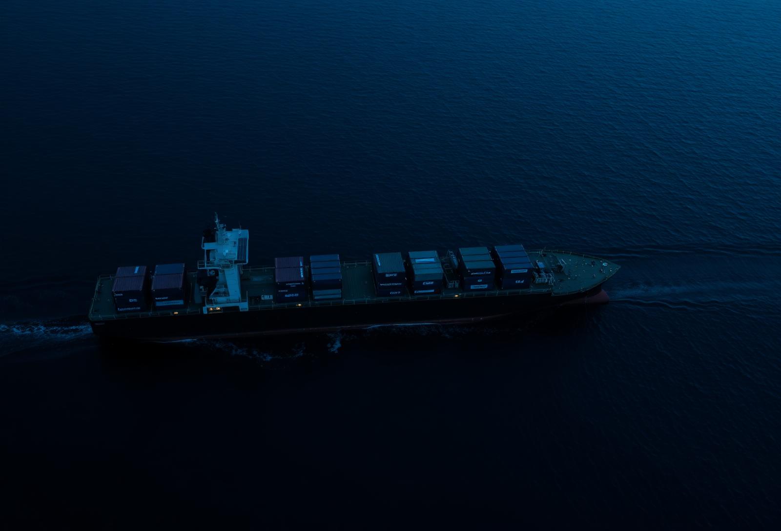 Container ship at dusk